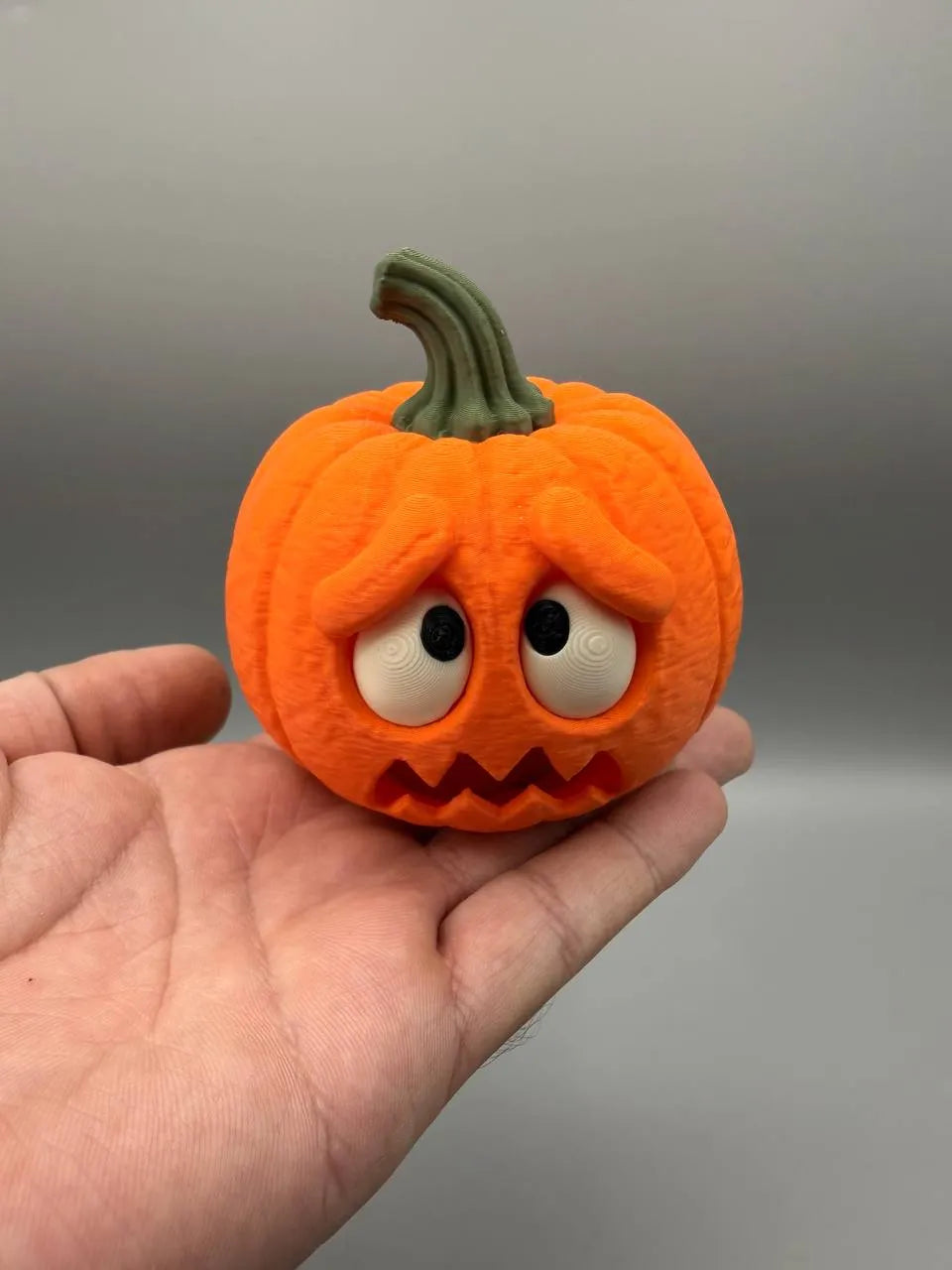Scared Pumpkin with Flickering LED Tealight