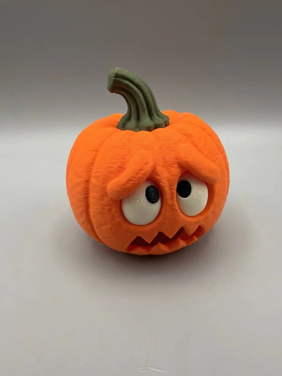 Scared Pumpkin with Flickering LED Tealight