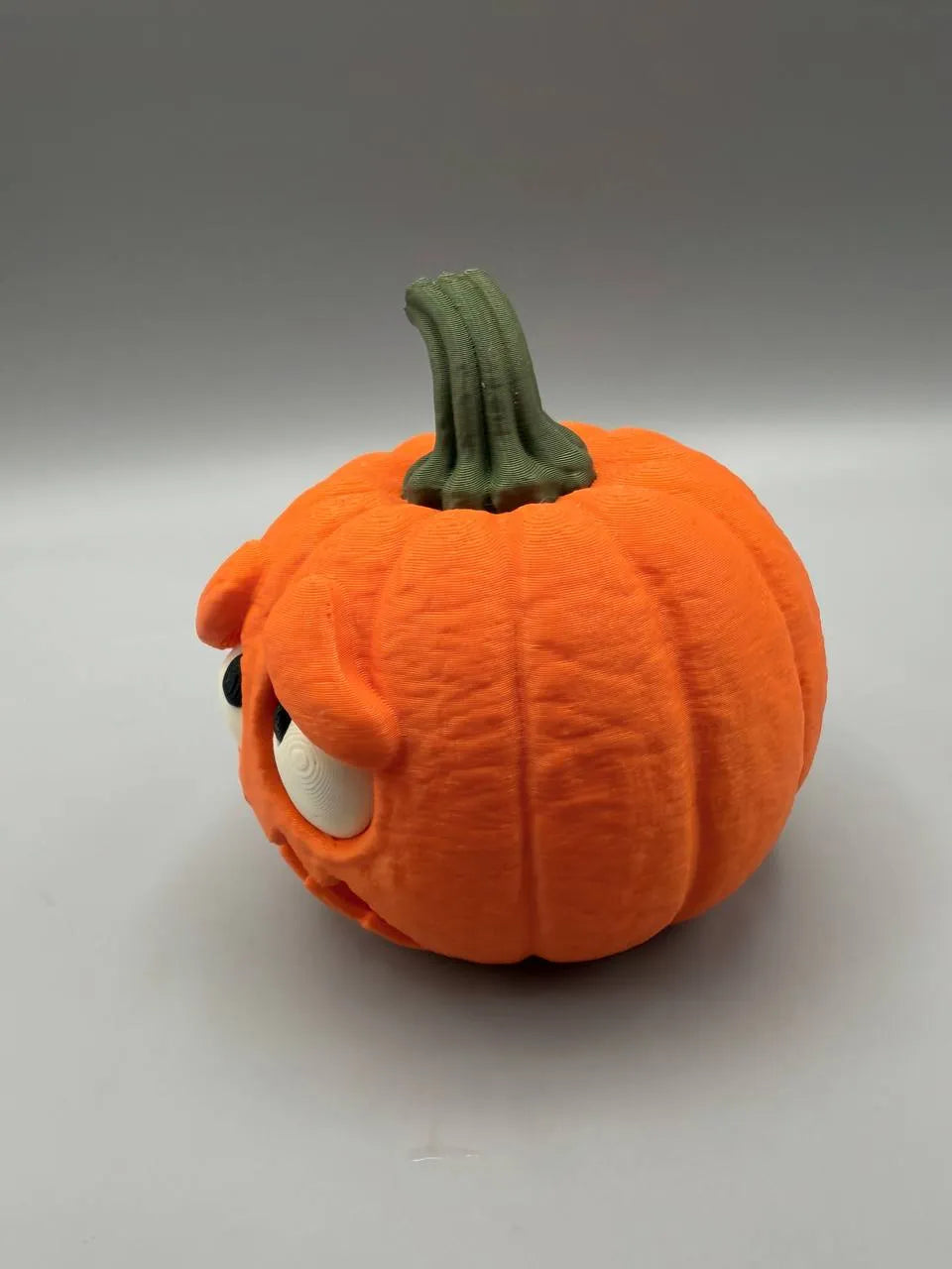 Scared Pumpkin with Flickering LED Tealight